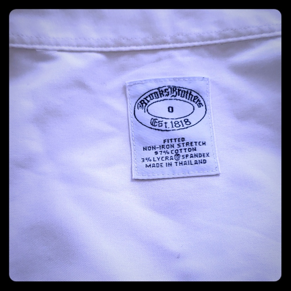 Sleeveless white button shirt